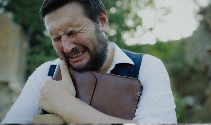 Lost Time — clutching the briefcase